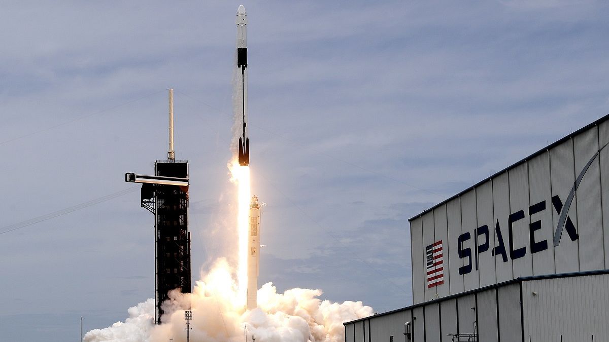 A SpaceX Falcon 9 rocket with a Dragon 2 spacecraft lifts off on pad 39A at the Kennedy Space Center for a re-supply mission to the International Space Station from Cape Canav