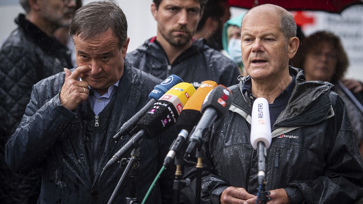 Armin Laschet (L) and Olaf Scholz (R),  address the media during a press conference in Stolberg, Germany that was hit by heavy rain and floods, on Aug.3, 2021.