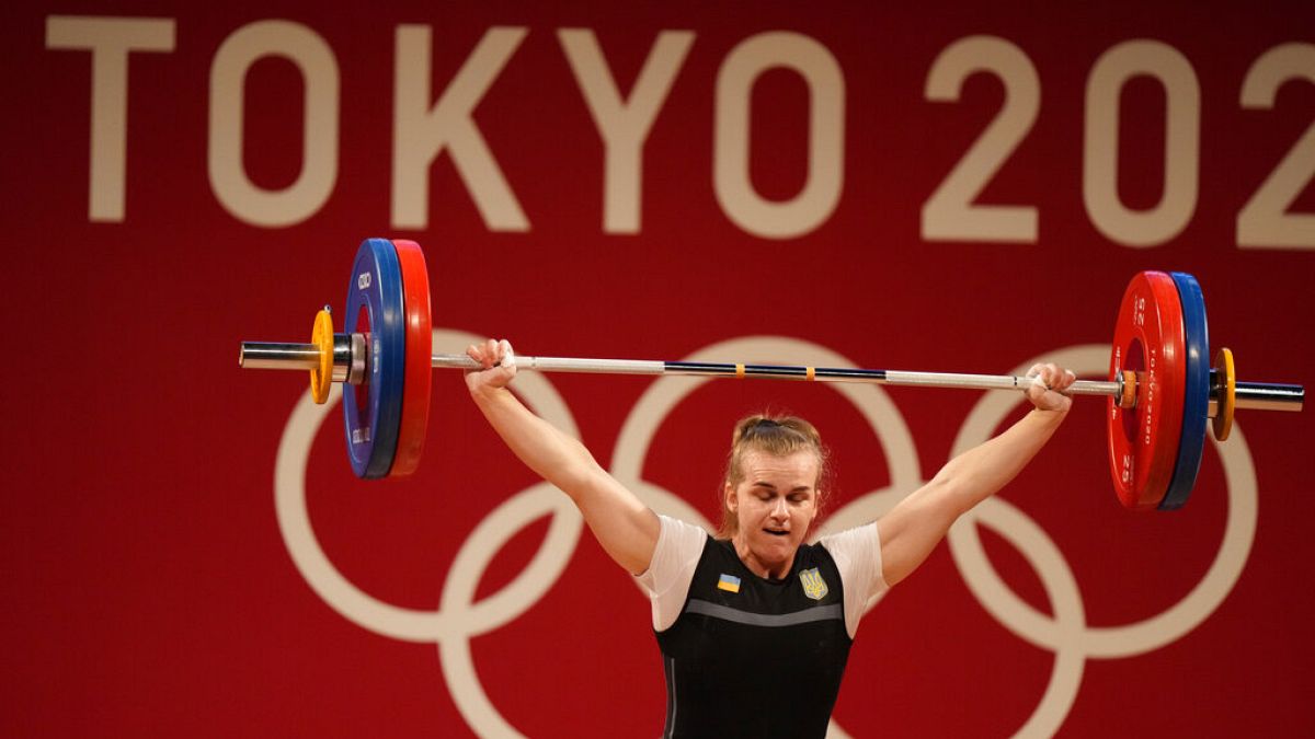 Iryna Dekha of Ukraine competes in the women's 76kg weightlifting event, at the 2020 Summer Olympics, Sunday, Aug. 1, 2021, in Tokyo, Japan.