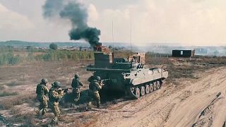 Tanks and motorised riflemen firing at the mock enemy.