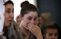 Une femme yezidi pleure après avoir quitté Sinjar en Irak, théâtre de violences perpétrées par le groupe Etat islamique, le 5 août 2014