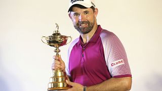 Europe's captain Padraig Harrington  holds the Ryder Cup during a press conference in 2019.