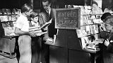 School children look at school books in a bookstore in Paris, September, 1946