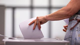 A vote is cast at a polling station during the Saxony-Anhalt state elections in Wittenberg.