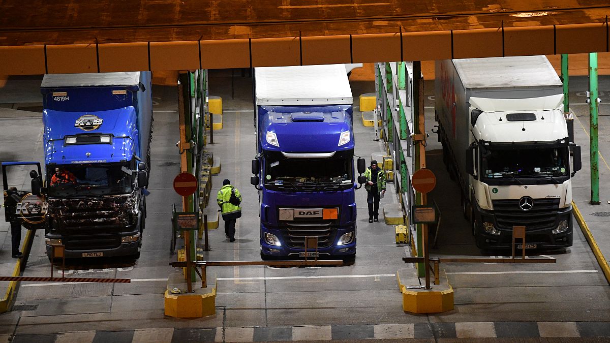 In this file photo taken on December 31, 2020 after disembarking from a ferry, lorries undergo checks at the port of Dover on the south-east coast of England.