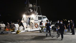 A coast guard vessel arrives with two bodies at Pythagorio port, on the eastern Aegean island of Samos.