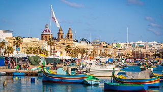 Malta port with multiple boats in the harbour