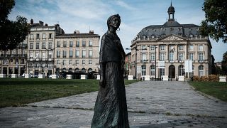 statue created by Haitian sculptor Caymitte Woodly, known as Filipo, depicting Modeste Testas, a slave who was bought by two brothers from Bordeaux in the 18th century