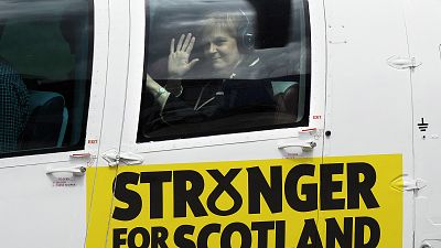 Nicola Sturgeon takes off in a Scottish branded helicopter Nicola Sturgeon takes off in a Scottish branded helicopter