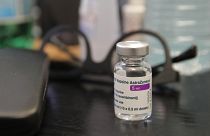 A vial of AstraZeneca COVID-19 vaccine is pictured at a family doctor office in France.