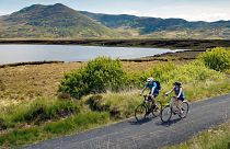 A pair cycles along the Great Western Greenway in Mayo.