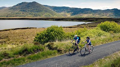 A pair cycles along the Great Western Greenway in Mayo.