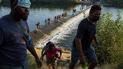 Haitianer überqueren den Rio Grande