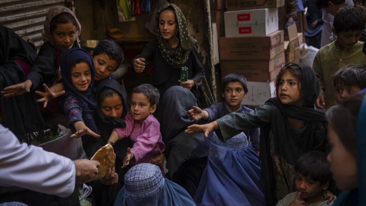 Afghan women in a bread queue in Kabul's old city