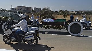 Algeria buries ex-president Bouteflika in muted funeral