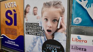 Posters for the yes and no campaigns in San Marino's abortion referendum