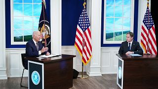 US President Joe Biden, with US Secretary of State Antony Blinken, holds a virtual meeting with the Major Economies Forum on Energy and Climate.