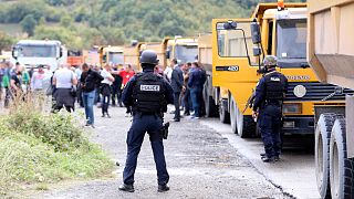 Kosovo special police stand on the road near the northern Kosovo border crossing of Jarinje.