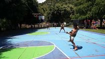 Jugadores guatemaltecos practican el juego de pelota maya, 18/9/2021, San Juan La Laguna, Guatemala
