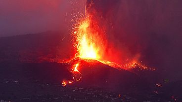 Lava from a volcano eruption flows on the island of La Palma in the Canaries, Spain, Tuesday, Sept. 21, 2021