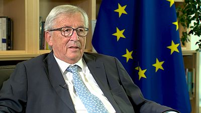 Merkel acertó en la crisis de los refugiados y fracasó en la crisis griega, dice Jean-Claude Juncker