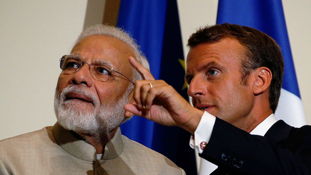 الرئيس الفرنسي ايمانويل ماكرون ورئيس الوزراء الهندي ناريندرا مودي 