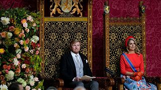 Queen Maxima listens as Dutch King Willem-Alexander marks the opening of the parliamentary year.