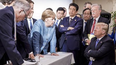 Angela Merkel se dirige a Donald Trump en una imagen emblemática de la reunión del G7 de junio de 2018 en Québec, Canadá. 