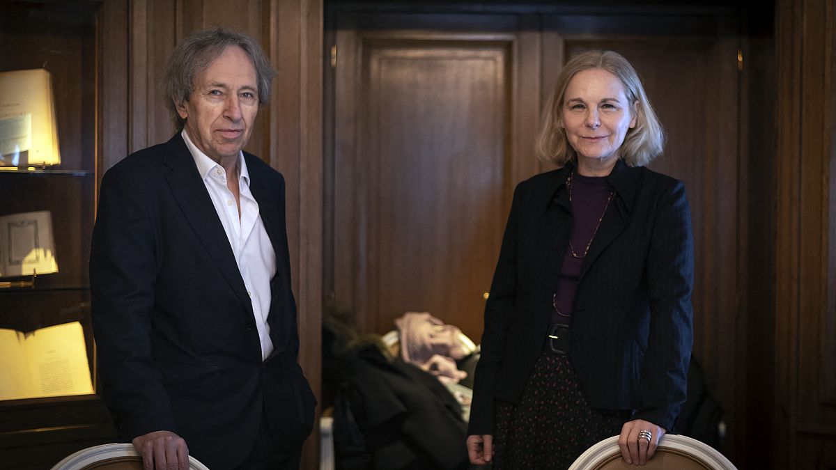 Camille Laurens (R) with Pascal Bruckner pose before a Goncourt literacy price judges meeting at the Drouant restaurant in Paris, March 2020