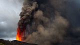 Lava and ashes from a volcano eruption flow on the island of La Palma in the Canaries, Spain, Wednesday, Sept. 22, 2021
