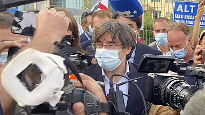 Catalan leader Carles Puigdemont, leaves the jail of Sassari, in Sardinia, Italy, on Friday.
