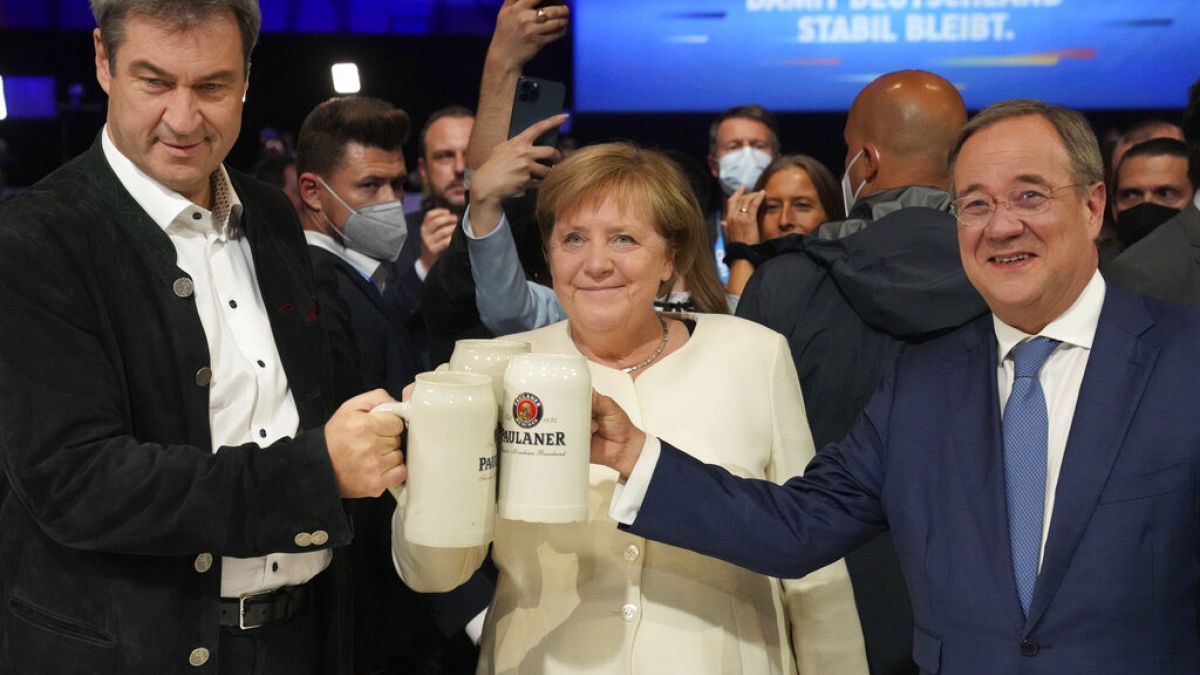 Markus Söder, Angela Merkel und Armin Laschet in München