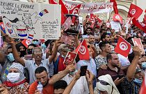 Demonstrators chant slogans during a protest in Tunisia's capital Tunis on September 26, 2021, against President Kais Saied's recent steps to tighten his grip on power.