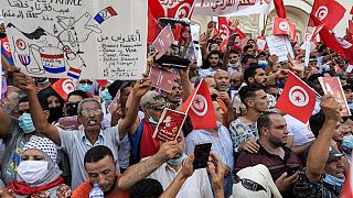 Demonstrators chant slogans during a protest in Tunisia's capital Tunis on September 26, 2021, against President Kais Saied's recent steps to tighten his grip on power.