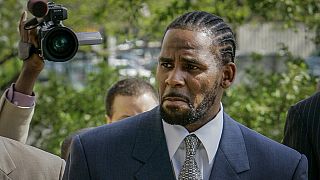 R. Kelly arriving for the first day of jury selection in his child pornography trial 