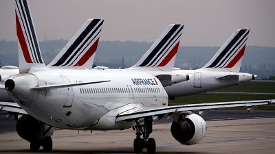 Planes on the runway at Paris Charles de Gaulle Planes on the runway at Paris Charles de Gaulle