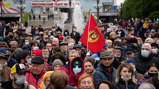 Demonstrators gather during a protest against the results of the parliamentary election in Moscow.