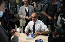 Eric Zemmour signs his latest book Friday, Sept. 17, 2021 in Toulon, southern France.