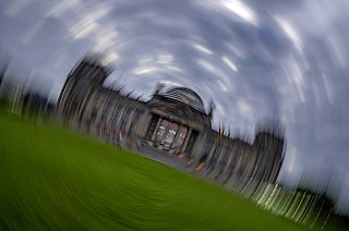 Picture taken while turning the camera shows the Reichstag building with the German parliament in Berlin, Germany, Sunday, Sept. 26, 2021.