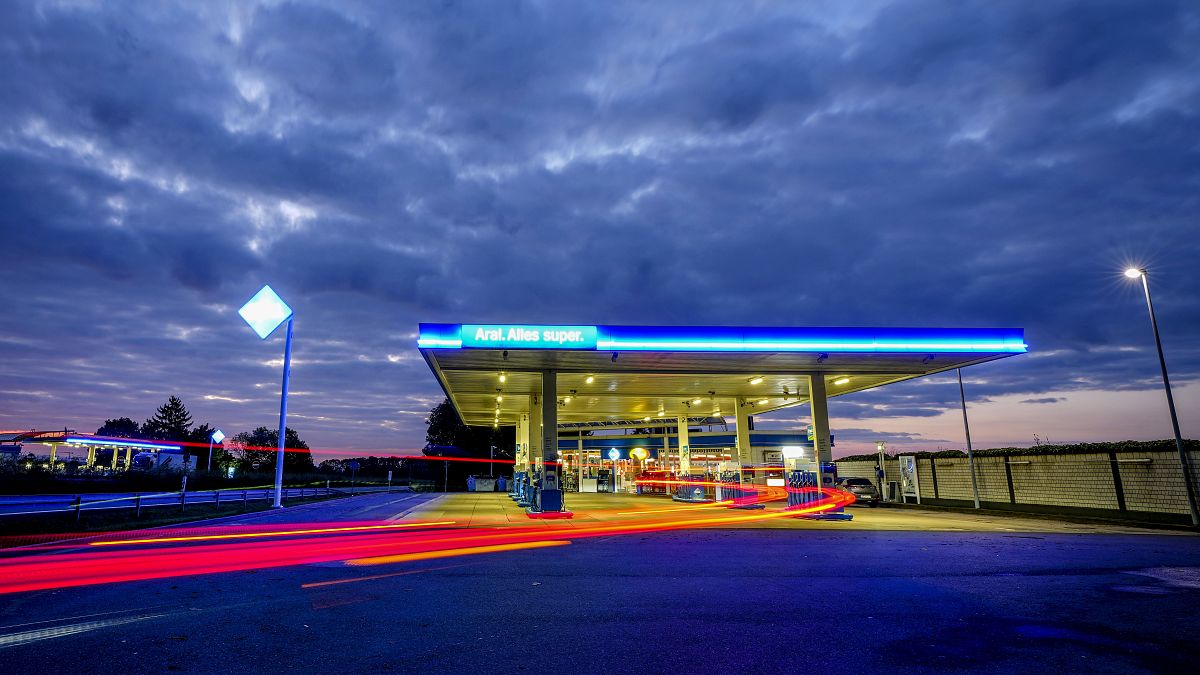 In this Sunday, Sept. 12, 2021 file photo, a long exposure photo shows a car approaching a gas station at a highway in Frankfurt, Germany.