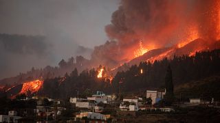 Mount Cumbre Vieja erupts in El Paso, spewing out columns of smoke, ash and lava as seen from Los Llanos de Aridane on the Canary island of La Palma.