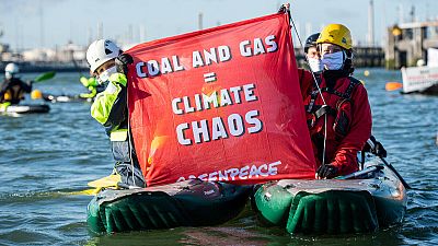More than 80 Greenpeace Netherlands activists from 12 EU countries are using fossil fuel ads from all over Europe to block the entrance to Shell’s oil refinery.