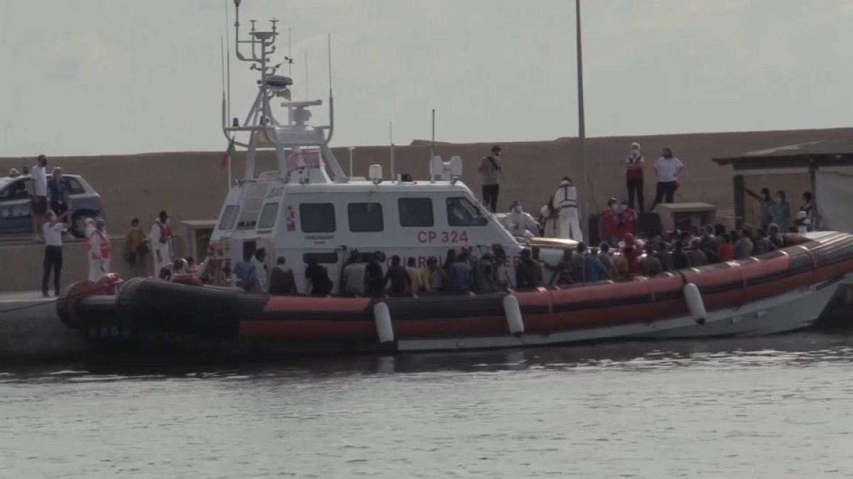 Hundreds of migrants land on the Italian island of Lampedusa