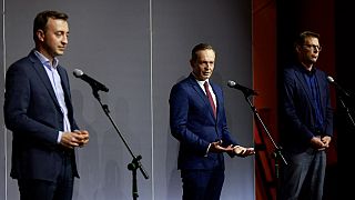 CDU's Paul Ziemiak, FDP's Volker Wissing & CSU's Markus Blume speak to the media following coalition talks, in Berlin on October 3, 2021.