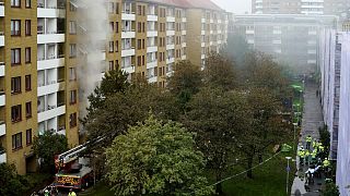 The explosion and fire at a large apartment building last week that injured 16 people, four of them seriously.