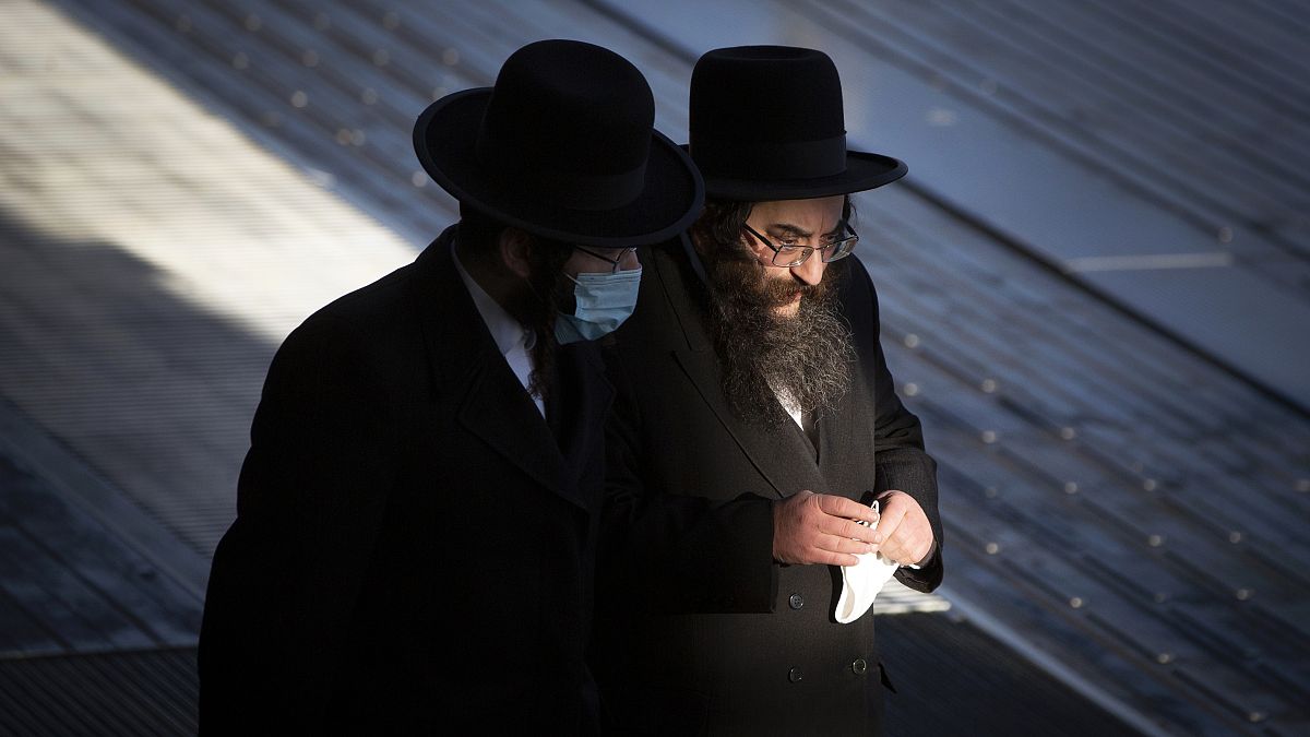 Two ultra-Orthodox Jewish men are pictured in Antwerp, Belgium.