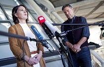 Annalena Baerbock, left, co-chairwoman of the German Green party (Die Gruenen), and Robert Habeck, the party's co-chairman, give a press conference on coalition talks