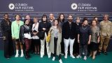 The cast of La Mif join director Fred Baillif on Zurich Film Festival's green carpet