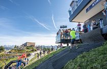Runners start the race from the Starthaus at the top of the Hahnenkamm ski slope