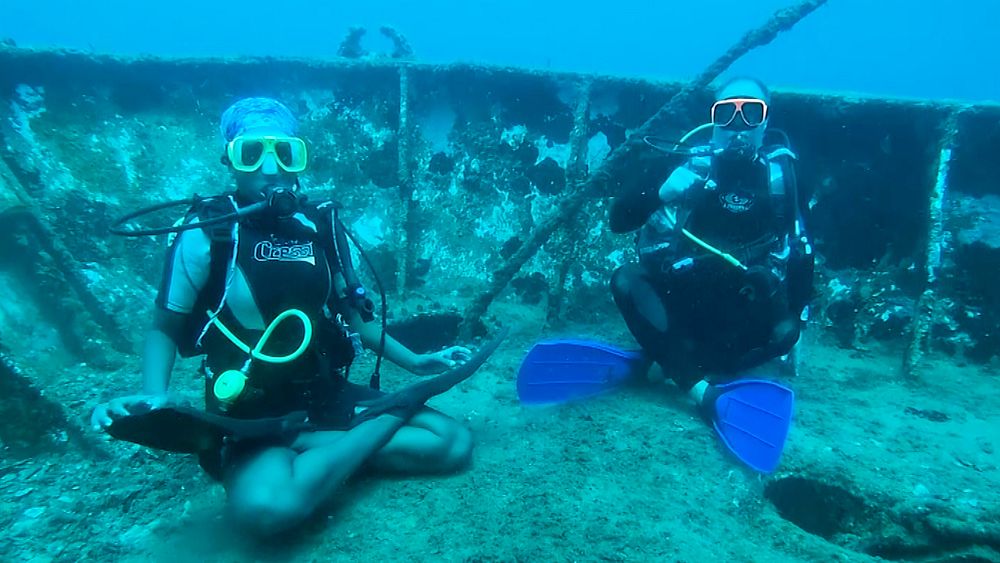 Feeling stressed? Try a yoga session at the bottom of the sea